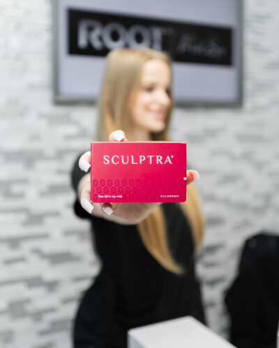 Hannah holds sculptra